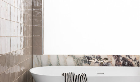 Room of the Week: A Striking Marble Stars in a Family Bathroom