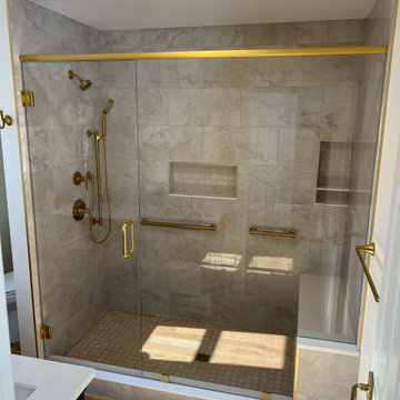 Frameless Glass Shower with Gold Hardware