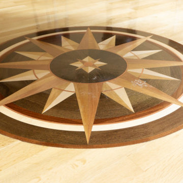 Custom wood flooring border and medallion - compass inlay