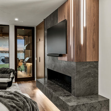 Modern Luxury Lakehouse Fireplace with Wood and LED Lighting Accent Wall and Eve