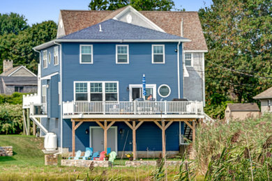 Beach style home design photo in Providence