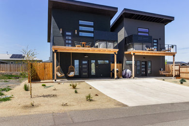 Example of a minimalist exterior home design in Other