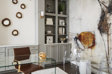 Study room - large transitional freestanding desk dark wood floor study room idea in Orlando with white walls