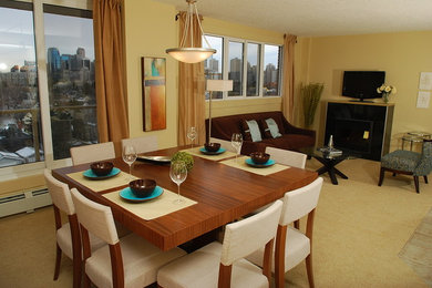 Great room - mid-sized contemporary carpeted great room idea in Calgary with beige walls