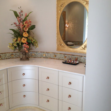 Master Bath with curved cabinets
