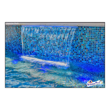 (Rennehan) FT MYERS FL Superior Pools Swimming Pool With Raised Wall & Waterfall