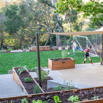 DG Patio with shade sail above Soccer Field terrace