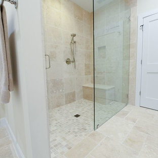 Small coastal master beige tile and terra-cotta tile ceramic floor doorless shower photo in Jacksonville with flat-panel cabinets, white cabinets, beige walls, a drop-in sink and granite countertops