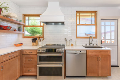 Example of a transitional kitchen design in San Francisco