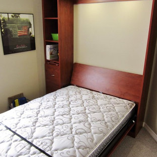 Inspiration for a small timeless carpeted and brown floor home office remodel in Tampa with beige walls