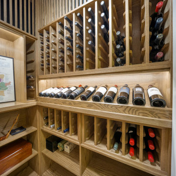 Traditional Oak Wine Cellar with Built-In Lighting – Chicago