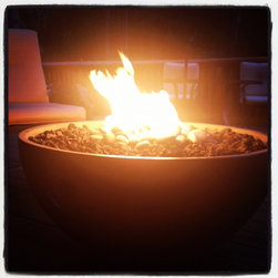 Hemi Fire Pit in use at a client's property - Fire Pits