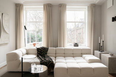 Trendy living room photo in Amsterdam