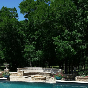 Outdoor stone sofa and fire pit