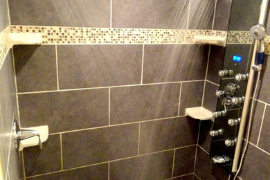 Inspiration for a modern master gray tile and ceramic tile double shower remodel in Charleston