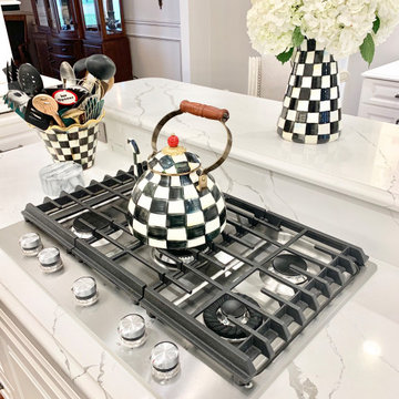 Ivory White Kitchen With Marble Look Quartz Counters and Splash