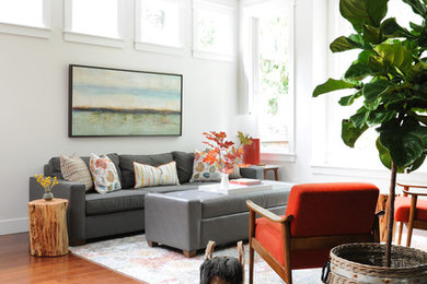 Mid-sized transitional open concept dark wood floor living room photo in Vancouver with white walls, a standard fireplace, a wood fireplace surround and no tv