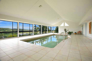 This is an example of a contemporary pool in Central Coast.