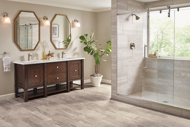 Large transitional master gray tile and porcelain tile vinyl floor and beige floor alcove shower photo in Other with shaker cabinets, dark wood cabinets, beige walls, an undermount sink and a hinged shower door