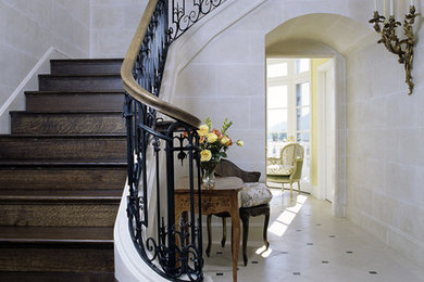 This is an example of a traditional foyer in Santa Barbara with beige walls.