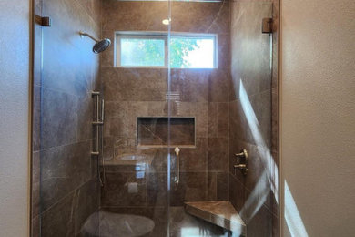 Example of a mid-sized 3/4 multicolored tile and ceramic tile ceramic tile, multicolored floor and single-sink bathroom design in San Francisco with shaker cabinets, brown cabinets, a one-piece toilet, multicolored walls, a drop-in sink, quartz countertops, white countertops and a floating vanity