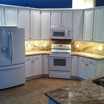 Cabinet Refacing Done in Maple and Painted in Classic White