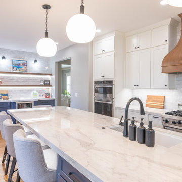 Porcelain Island Kitchen Remodel with Custom Built-Ins + Fireplace Feature