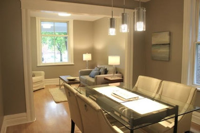 Enclosed dining room - mid-sized traditional light wood floor enclosed dining room idea in Ottawa with no fireplace
