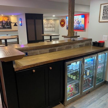 Basement Remodel with bar and game room