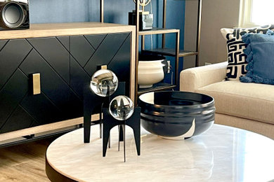 Example of a small trendy brown floor dining room design in Los Angeles with blue walls