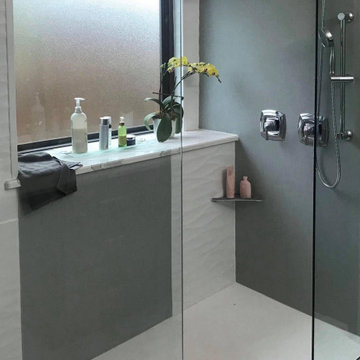 Modern Walk-In Shower with Fixed Glass Wall Panels