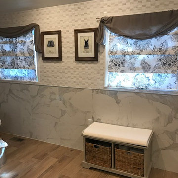 White Master Bath using a mix of Quartz, Porcelain tile and Natural stone mosaic