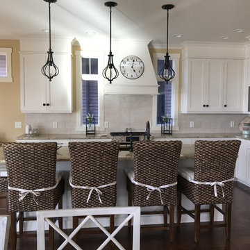 Neutral Sunbrella stripes create comfort in kitchen