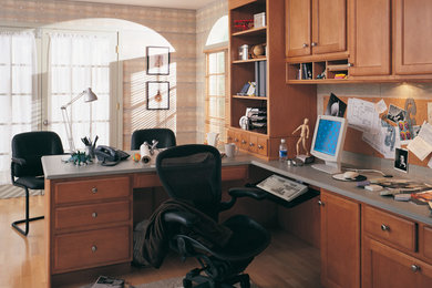 Study room - mid-sized traditional built-in desk light wood floor and beige floor study room idea in Other with multicolored walls