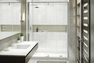 Contemporary bathroom in Montreal with an alcove shower, white tile and grey walls.