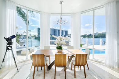 Dining room - contemporary dining room idea in Miami