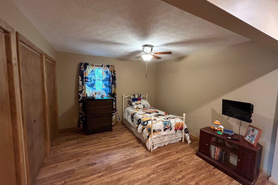 Example of an arts and crafts kids' room design in Other