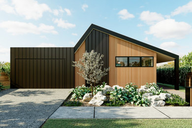 Design ideas for a modern one-storey brown house exterior in Melbourne with a gable roof and a metal roof.