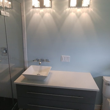 MODERN STYLE VANITY AND TILED SHOWER