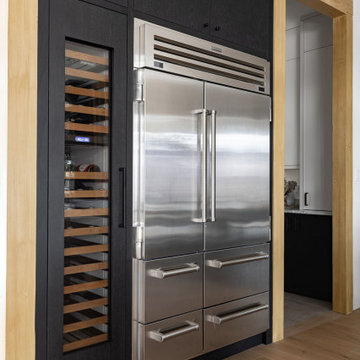 Red Oak and Black Kitchen with Custom Wine Fridge