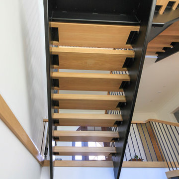 96_Dramatic cantilevered no-riser staircase, Bethesda, MD 20814