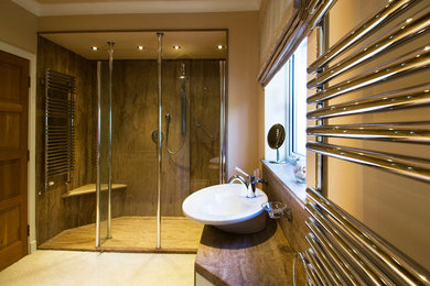 Photo of a mid-sized traditional kids bathroom in Other with a vessel sink, furniture-like cabinets, white cabinets, solid surface benchtops, an open shower and beige walls.