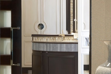 Bathroom - huge modern master blue tile and glass tile limestone floor bathroom idea in Chicago with raised-panel cabinets, dark wood cabinets, a one-piece toilet, beige walls and an undermount sink