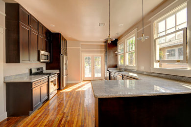 Example of a mid-sized minimalist kitchen design in New Orleans