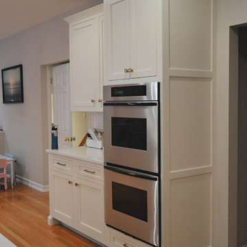 Chappaqua NY - Custom White & Navy Cabinets w/ Honey Bronze