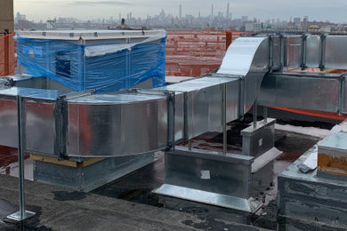 Installation of ductwork for rooftop heating and cooling