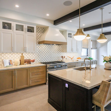Transitional Kitchen with Brass Lighting and Custom Hood