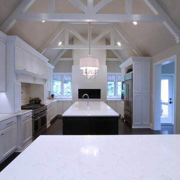 Carmel White Kitchen Renovation with Vaulted and Beamed Ceiling
