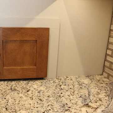 Kitchen With Unique Granite and Small Island in Moline, IL