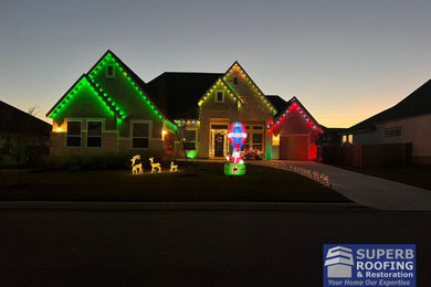 Example of a one-story house exterior design in Other